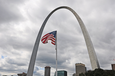 Gateway Arch and USA flag