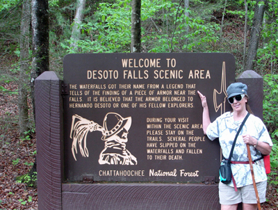 Karen Duquette and the welcom to Desoto Falls sign