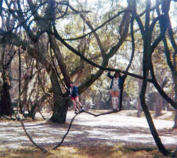 Brian and Renee playing in the trees