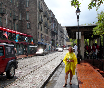 Karen Duquette in the rain on River Street