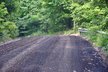 a freshly oiled road