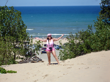 Karen Duquette on a sand dune by Lake Michigan