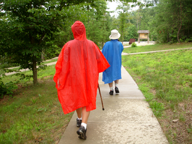 Lee Duquette and Alex in rain gear