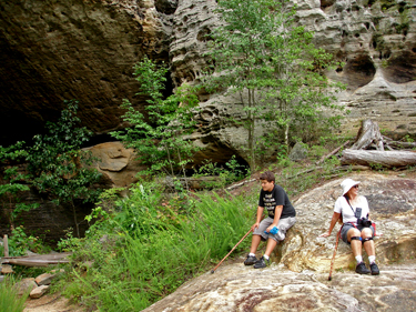 Karen Duquette and her grandson take a break at Natural Arch