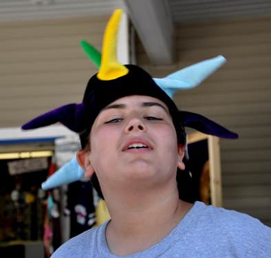 Alex tried on some silly hats