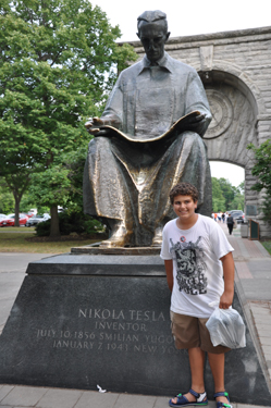 Alex at statue of Nikola Tesla