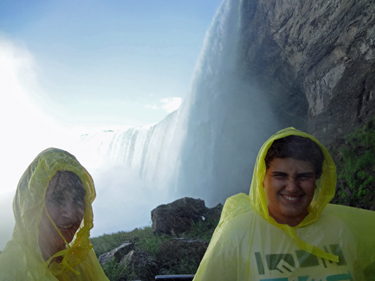 Karen Duquette and Alex getting wet at Niagara Falls