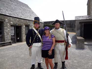 Karen Duquette and two solders at Old Fort Niagara