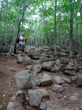 Lee Duquette on the rocky trail to Bubble Rock.