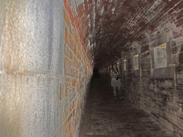 Karen Duquette in a tunnel at Fort Knox