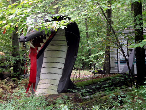 a giant snake at a campsite 