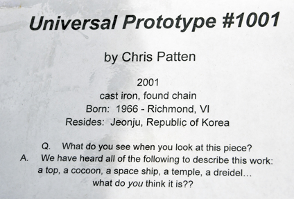sign about the Universal Prototype 1001 sculpture