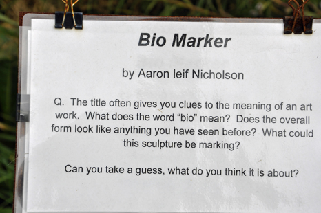 sign about the Bio Marker sculpture