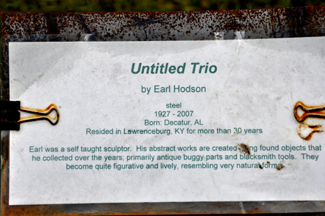 sign about the Untitile Trio  Sculpture