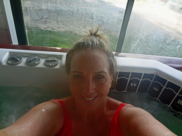 Karen relaxes in the indoor hot tub at the campground