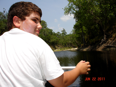 Alex paddling the canoe on the Suwannee River