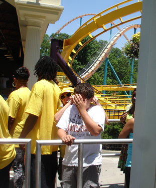 Karen Duquette and her grandson in line to ride The Georgia Scorcher at Six Flags