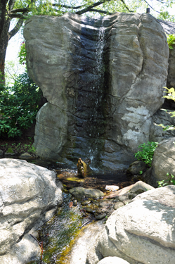 small waterfall at the entrance of Rock City