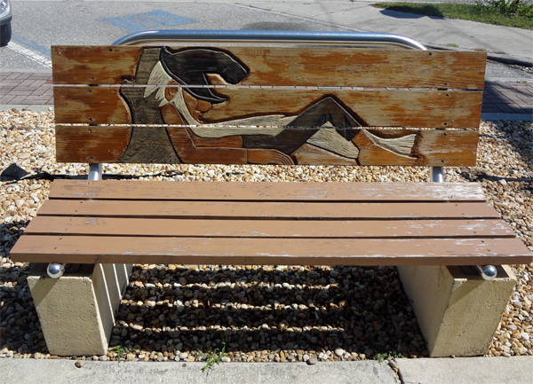 painted bench - person napping