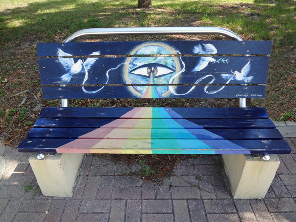 painted bench -eyeball and birds