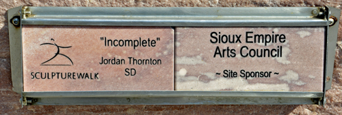sign about the sculpture shown below