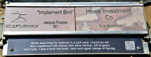 sign: Implement Bird sculpture