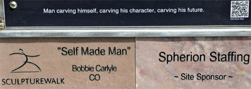 sign: Self Made Man sculpture