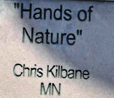sign: Hands of Nature sculpture