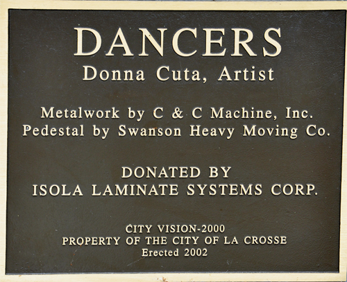 sign about the sculpture entitled Dancers