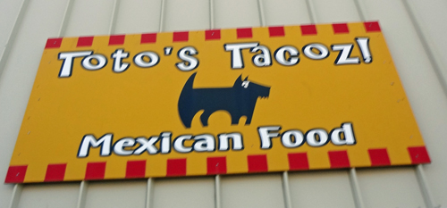 sign: Toto's Taco's Mexican Food