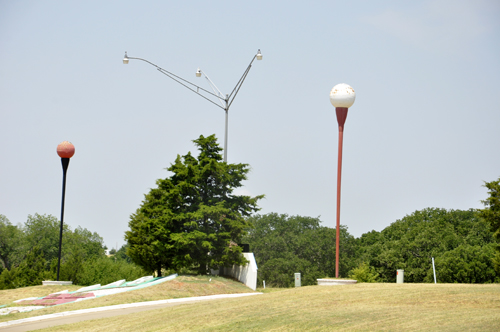light poles shaped like golf balls