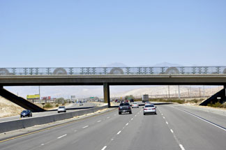 a nice looking bridge over the highway in southern California