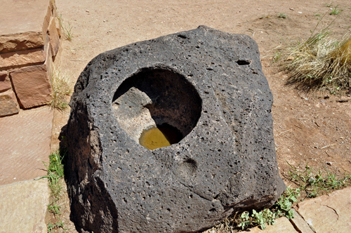 a big rock with a hole in the top