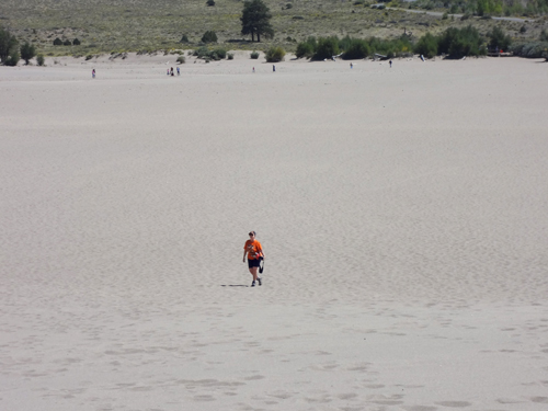 Karen Duquette approaching the sand dunes at Great Sand Dunes National Park