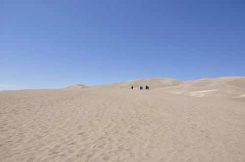people on the sand dunes