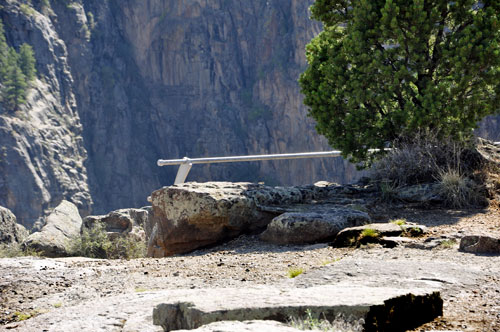 a partial railing keeps you safe from falling into the canyon