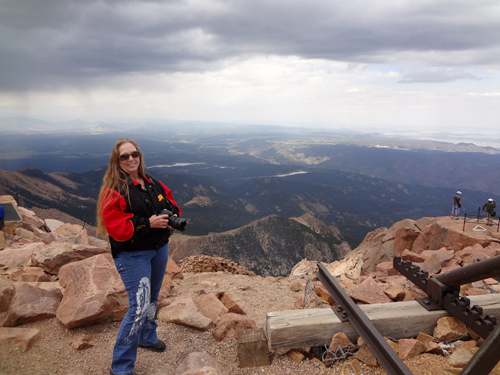 Karen Duquette on the summit of Pikes Peak