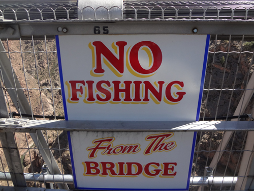 sign: no fishing from bridge