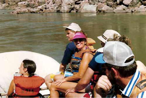 Karen Duquette on the raft in the Grand Canyon