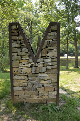 the art sculpture made of steel and stone