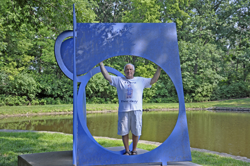 Lee Duquette by the art sculpture