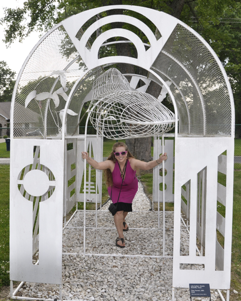 Karen Duquette in the art sculpture Time Tunnel