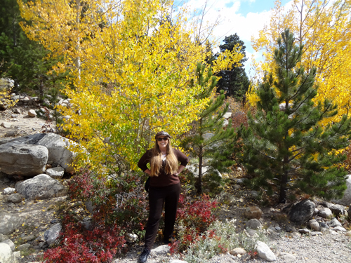 Karen Duquette and fall foliage at Rocky Mountain National Park