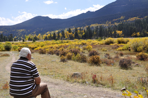 Lee Duquette watches the elk at Rocky Mountain National Park