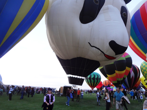 Karen Duquette in fromt of the panda balloon
