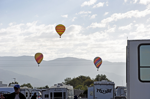 hot air balloons drift right over the campground