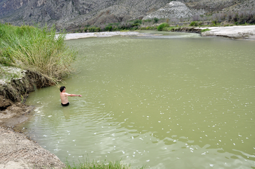 someone bathing in the Rio Grande River