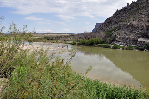 a birds-eye view of people swimming in the Rio Grande