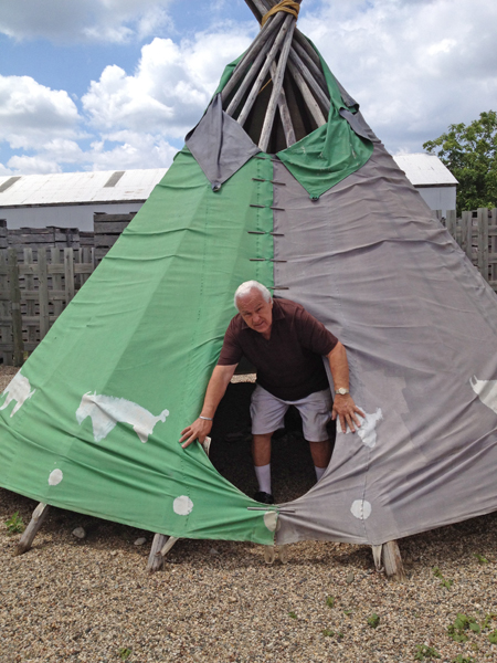 Lee Duquette in the teepee at Fort Custer Maze