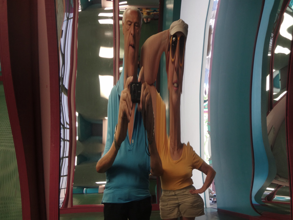 the two RV Gypsies photograph themselves in funny mirrors
